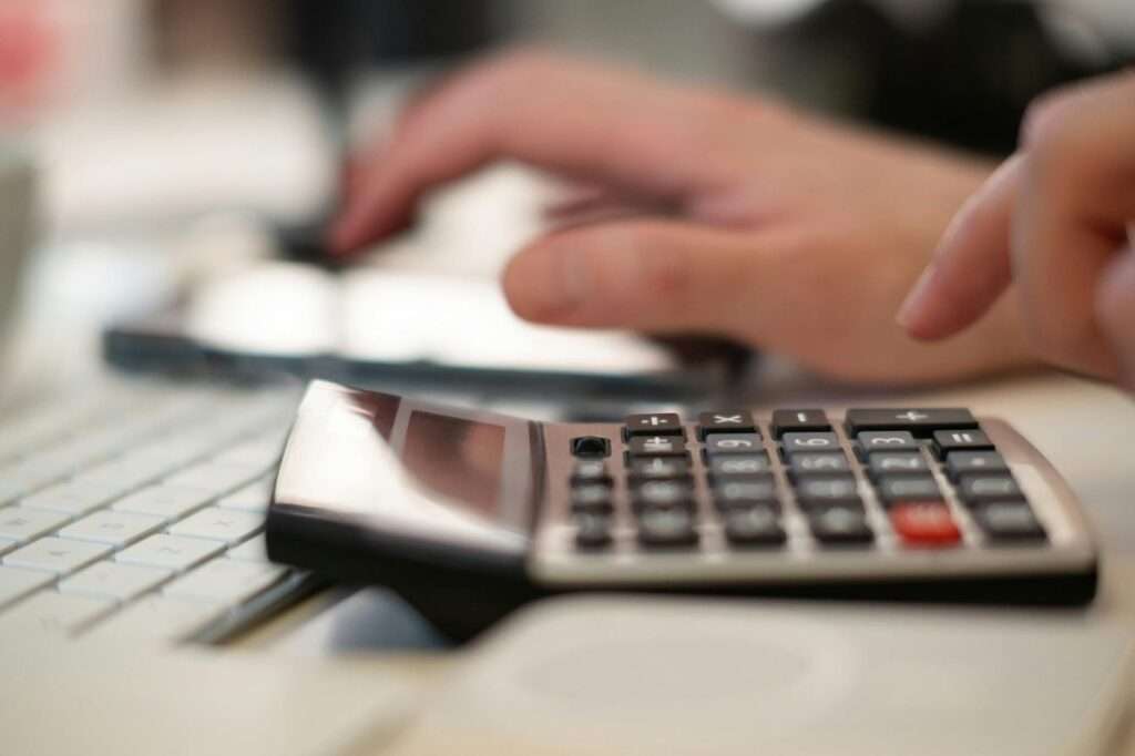 person using calculator