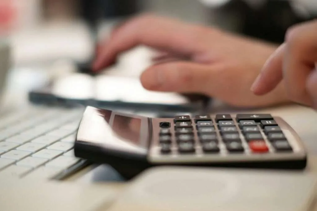 person using calculator
