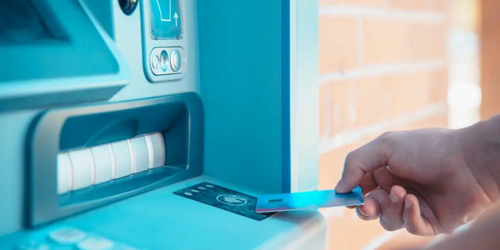 Debit card ATM withdrawals versus point-of-sale spending in India