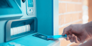 81% of Your Debit Card Swipes Are Still ATM Withdrawals — Here's Why That's Costing You More Than You Think There's a quiet financial habit draining millions of Indian households every single month, and most people don't even realize it's happening. You walk up to an ATM, punch in your PIN, pull out ₹5,000 in crisp notes, and go about your day. It feels normal. It feels safe. It feels like you're in control of your money. But here's what no one tells you at the ATM screen: that single withdrawal might be the most expensive transaction you make all week — not because of the fee you see, but because of the dozens of costs you don't. Reserve Bank of India data and multiple fintech research studies consistently show that a staggering 81% of debit card usage in India still occurs at ATMs in the form of cash withdrawals, rather than as point-of-sale (POS) or digital payments. In a country that launched one of the world's most ambitious digital payment revolutions through UPI and RuPay, that number is both remarkable and deeply revealing. It tells us that despite the infrastructure, despite the convenience, and despite years of financial literacy campaigns, the cash habit hasn't just survived — it's thriving. This isn't a judgment. This is a forensic look at what that habit is actually costing you, your household, and your financial future. The Visible Cost: ATM Fees You're Paying Without Thinking Let's start with the obvious. Every Indian bank allows a limited number of free ATM transactions per month — typically five at your own bank's ATMs and three at other bank ATMs in metro cities. Beyond that, you're charged ₹21 per transaction (as per current RBI-mandated caps), and that's before GST is added on top. If you're someone who visits the ATM eight to ten times a month — which is entirely common for salaried individuals managing household expenses — you could easily rack up ₹100 to ₹200 in direct ATM fees every month. That's ₹1,200 to ₹2,400 per year, just in transaction charges. Compounded over a decade, and adjusted for even modest inflation, that's money that could have funded a short trip, a recurring deposit, or a significant portion of an emergency fund. Now multiply that by India's 300+ million debit card holders who still primarily use ATMs, and you start to understand why this habit, at a macroeconomic level, represents one of the largest preventable financial drains in the country's retail banking ecosystem. The Hidden Cost: The Cash Handling Tax Nobody Talks About Here's where it gets more nuanced — and more expensive. When you withdraw cash, you don't just pay the ATM fee. You pay what economists call the "cash handling tax," a collection of indirect costs that are real, measurable, and almost universally ignored. The first component is time cost. The average ATM trip in a Tier 1 or Tier 2 Indian city takes between 15 and 25 minutes when you factor in travel, queuing, and the transaction itself. If you visit an ATM ten times a month, you're spending roughly 3 to 4 hours per month in transit and queuing. At India's growing average urban wage, that time has a monetary value — one that never appears on your bank statement but absolutely appears in your quality of life. The second component is cash leakage. Behavioral economists have documented this extensively: people spend cash faster and with less deliberation than they spend digitally. When you have ₹3,000 in your wallet, the psychological friction of spending it is dramatically lower than when you have to tap, scan, or enter a PIN for every transaction. Studies from the National Institute of Public Finance and Policy suggest that households managing primarily in cash consistently underestimate their monthly expenditure by 18 to 25%. That gap between what you think you're spending and what you're actually spending is cash leakage — and it compounds mercilessly over time. The third component is lost float and interest. When money sits in your savings account, it earns interest — typically 2.5% to 4% per annum in Indian savings accounts, and up to 6 to 7% in high-yield digital savings products. The moment you convert that money to cash and carry it in your wallet, it stops earning. For someone who keeps an average of ₹8,000 to ₹10,000 in cash at any given time, the annual opportunity cost in lost interest alone ranges from ₹200 to ₹700. Again, it doesn't sound catastrophic in isolation. But layer it on top of every other cash-related cost, and the picture changes. Why Indians Still Choose Cash: An Honest Look To understand why 81% of debit card transactions are still cash withdrawals, you have to start from a place of empathy rather than condescension. The reasons are structural, psychological, and in many cases, entirely rational from the individual's point of view. Merchant acceptance gaps remain a genuine barrier. Despite India having over 95 million UPI QR codes deployed as of 2024 and one of the fastest-growing POS terminal networks in the world, acceptance is still patchy in the informal economy. Your neighborhood vegetable vendor, the roadside dhaba, the auto-rickshaw driver, the domestic help, the plumber — a significant portion of daily transactional life still operates outside the formal digital payment grid. When your daily spending environment demands cash, withdrawing cash isn't irrationality; it's pragmatism. Distrust of failed transactions is another major factor. Anyone who has experienced a UPI transaction fail mid-payment at a grocery checkout knows the anxiety that follows. Even though failed transactions are resolved within 48 to 72 hours under RBI's circular on failed digital transactions, the emotional and social cost of standing at a counter while a payment fails is powerful enough to push people back toward cash as a default. One bad experience can undo six months of digital payment habit formation. Privacy and surveillance concerns are increasingly entering the conversation, particularly among older demographics and those with mixed formal and informal income streams. Cash transactions leave no digital trail, and for a population that is still building trust in institutional data handling, that anonymity has value — even at a financial cost. Financial illiteracy about costs is perhaps the most systemic issue. Most people who withdraw cash from ATMs have no idea what that habit is actually costing them in aggregate. They see the ₹21 charge on an occasional transaction and dismiss it as negligible. They've never sat down and calculated the full lifecycle cost of their cash dependency. Nobody has shown them the math. What the Research Actually Shows About Digital vs. Cash Spending The research on cash versus digital spending behavior is remarkably consistent across geographies and income levels. A landmark study by the Mastercard Center for Inclusive Growth found that households that transition from primarily cash-based to primarily digital payment systems save an average of 8 to 12% of their monthly discretionary expenditure — not because they're earning more, but because digital payments create natural points of friction, reflection, and record-keeping that cash simply doesn't. In India specifically, a 2023 study co-authored by researchers from IIM Ahmedabad found that UPI users who tracked their transaction history through banking apps had a measurably higher savings rate than demographically matched peers who primarily operated in cash. The difference wasn't explained by income, age, or education level alone — it was explained by the simple fact that digital transactions are inherently visible, categorizable, and reviewable in a way that cash is not. When you can see exactly where ₹47,000 went last month — broken down by merchant, category, and time — you make better decisions this month. Cash offers no such mirror. The Compound Effect: Small Leakages, Large Consequences Let's run the actual numbers for a median Indian salaried household with a monthly income of ₹45,000 to ₹60,000. Direct ATM fees annually: approximately ₹1,500. Lost interest on idle cash: approximately ₹500. Cash leakage through undisciplined spending (conservative 10% of cash withdrawn): approximately ₹4,800 to ₹6,000. Time cost, valued at a conservative ₹100 per hour for 36 hours per year: ₹3,600. Total annual cost of the cash habit for an average household: ₹10,400 to ₹11,600. Over ten years, without even accounting for inflation or investment compounding, that's over ₹1 lakh. Invested in a simple SIP returning 12% annually, the amount that a typical household could have saved by transitioning to digital payments grows to approximately ₹1.8 to ₹2 lakh over a decade. That is not a rounding error. That is a life event — a child's education fund, a down payment, a medical emergency buffer. The Merchant Side of the Equation It's also worth understanding this from the merchant's perspective, because the cash economy imposes costs on the people you buy from, and those costs ultimately come back to you in the price of goods and services. Merchants who operate primarily in cash face significant overhead: cash counting and management time, risk of theft, costs of depositing large amounts at banks, the inefficiency of making change, and the inability to access formal credit because they have no documented transaction history. A 2024 NASSCOM report estimated that small Indian merchants lose approximately 2 to 3% of revenue annually to cash-handling inefficiencies. To recover those costs, prices creep upward — subtly, gradually, but consistently. The cash economy is not free. It's just that its costs are distributed and invisible. When you pay digitally, you're not just helping yourself. You're participating in a system that makes credit more accessible for small businesses, reduces crime, lowers the cost of banking infrastructure, and contributes to GDP formalization — all of which have downstream benefits for the broader economy that eventually cycle back to you through better public services, lower inflation, and a more competitive commercial environment. Practical Steps to Break the ATM Dependency Understanding the cost of a habit is step one. Changing it requires intentional, friction-reducing strategies. Audit your cash usage for 30 days. Don't change anything yet — just track every cash transaction you make and categorize it. Most people are shocked to discover how many of their "cash-only" transactions could actually be completed digitally. The audit itself is one of the most powerful behavioral interventions available. Identify your recurring cash vendors and have a conversation. Many small vendors who appear to not accept UPI actually do — they just don't advertise it, or they haven't set it up recently. Simply asking "do you take GPay or PhonePe?" at your regular chai stall, vegetable market, or neighborhood kirana can eliminate several ATM trips per month immediately. Set a deliberate cash ceiling. Instead of withdrawing ₹5,000 to ₹8,000 "just in case," commit to carrying no more than ₹500 to ₹1,000 in cash at any time. This forces you to plan digital payments for known expenses and dramatically reduces impulse cash spending. Use your bank's spending analytics. Every major Indian bank — SBI, HDFC, ICICI, Axis, Kotak — now offers transaction categorization in its mobile app. Spend fifteen minutes each Sunday reviewing the previous week's digital transactions. This single habit, consistently maintained, has been shown to reduce discretionary overspending by 12 to 18% in behavioral finance studies. Automate your savings before they become spendable cash. Set up automatic transfers to a recurring deposit, mutual fund SIP, or high-yield savings account on the day your salary arrives. The money that never enters your spendable balance never gets withdrawn as cash and never leaks. The UPI Opportunity You're Leaving on the Table India's UPI system processed over 13 billion transactions in a single month in late 2024, making it one of the most extraordinary financial infrastructure achievements in modern history. The system is fast, largely reliable, zero-cost for consumers, and accepted at an ever-expanding range of merchants. And yet, millions of Indians are still using their debit cards primarily to pull cash from ATMs rather than to make direct digital payments. The irony is that the debit card in your wallet is a gateway to one of the world's most sophisticated payment ecosystems — and most of us are using it only to feed a cash habit that costs us money, time, and financial visibility every single month. RuPay debit cards, which are issued to over 60% of India's debit card holders, offer direct UPI-linked functionality, insurance benefits, and in some cases, cashback on POS transactions that ATM withdrawals simply don't provide. If you're holding a RuPay card and primarily using it at ATMs, you are leaving tangible benefits unclaimed. A Note on Financial Vulnerability and Cash Dependency It would be incomplete to discuss this topic without acknowledging that cash dependency is not uniformly a matter of choice. For India's 250 million-plus unbanked or underbanked citizens, for the elderly population navigating unfamiliar digital interfaces, for workers in predominantly cash economies where digital infrastructure simply hasn't reached, the ATM is not a bad habit — it's a lifeline. Financial inclusion must precede financial optimization. The solution to India's cash dependency problem isn't to shame people into using UPI; it's to expand digital infrastructure, improve transaction reliability, build multi-language financial literacy programs, and create regulatory environments where the cost of going digital is always lower than the cost of using cash. We are moving in that direction, but the work is incomplete. For those who do have access, choice, and awareness — which includes the overwhelming majority of working urban and semi-urban Indians reading this — the case for reducing ATM dependency is clear, quantified, and actionable starting today. The Bigger Picture Money is not just a resource. It's a system of habits, beliefs, and behaviors that compound over time. The 81% statistic isn't just a data point about payment preferences — it's a window into how deeply our financial instincts were shaped by decades of cash-first infrastructure, and how slowly those instincts update even when the world around them changes. The ATM is not your enemy. But treating it as your primary financial tool in 2026, when your phone can pay, track, invest, and protect your money simultaneously, is a choice that has a price. That price is measurable, and it's paid in small, invisible installments that rarely trigger alarm — until you sit down, run the numbers, and realize what a decade of cash dependency has quietly taken from you. The good news is that the cost of changing this habit is essentially zero. The infrastructure exists. The technology is in your pocket. The math is in your favor. The only thing required is the decision to use what you already have, differently.